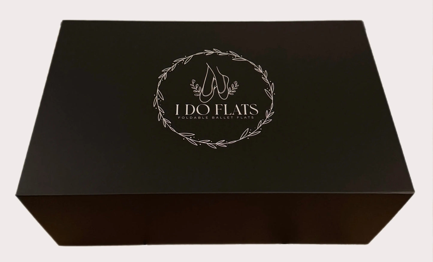 I Do Flats luxury black gift box with silver logo, containing Silver Veil foldable wedding flats